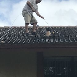 Dryer vent cleaning on top of roof